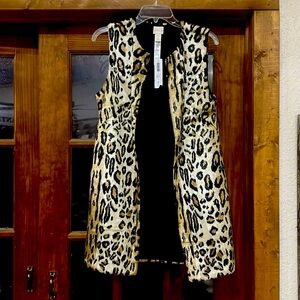 Leopard vest.  Brand new, never worn.  Chico size is zero. Fits like small